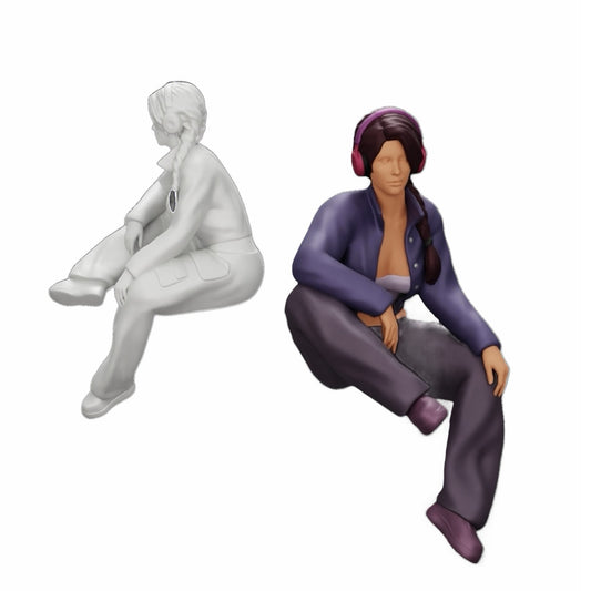 Foto de producto de modelismo diorama 0: Niña joven sentada escuchando música con auriculares (Ref Nr. A42)