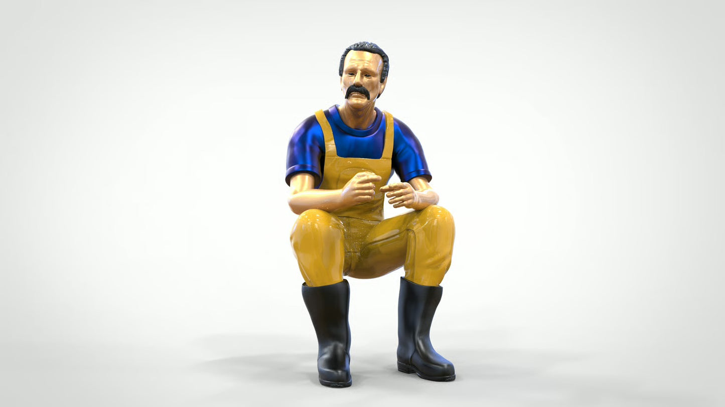 Diorama Modellbau Produktfoto 0: Sitzender Fischer mit Bart – Figur in Ölzeug und Gummistiefeln (Ref. Nr. 443)
