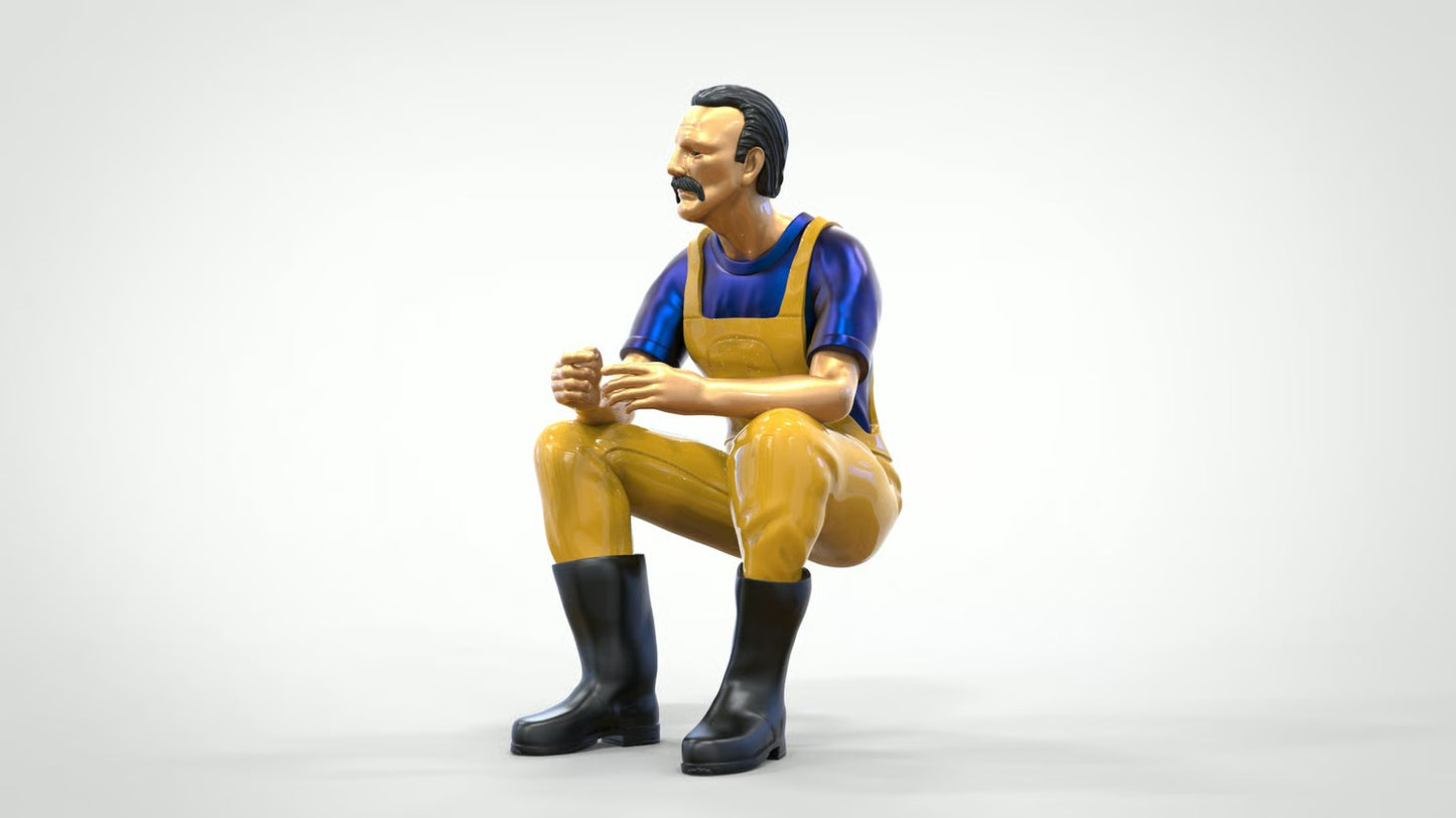 Diorama Modellbau Produktfoto 0: Sitzender Fischer mit Bart – Figur in Ölzeug und Gummistiefeln (Ref. Nr. 443)