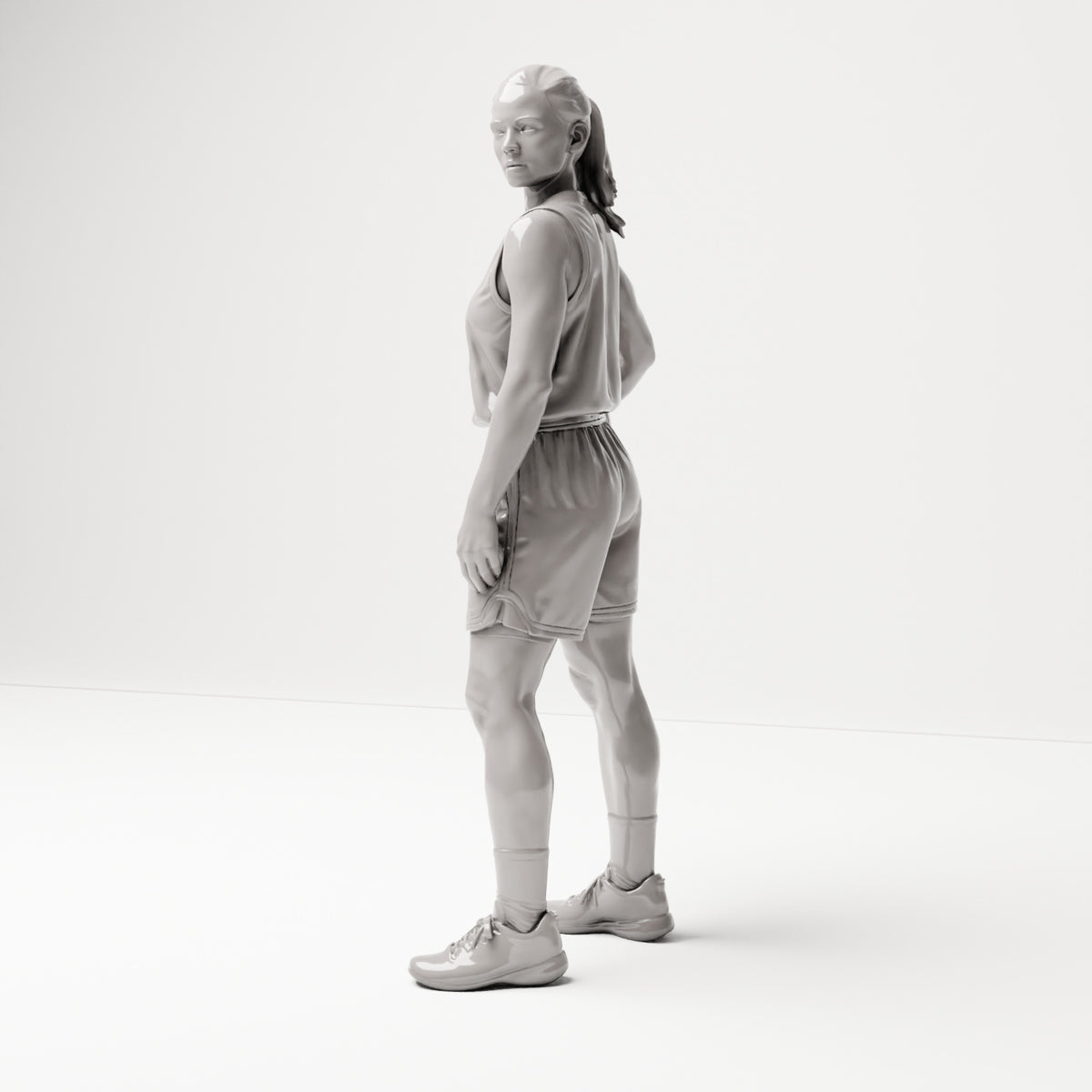 Stehende Figur: Basketballspielerin mit Ball an der Hüfte (B042) - linke Seitenansicht
