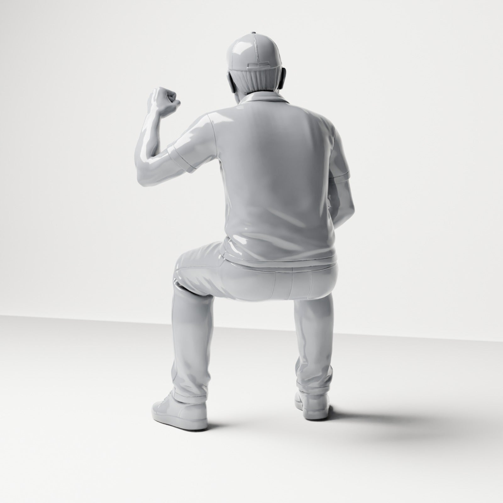 Foto de producto de maqueta para diorama 2: Figura sentada: espectador masculino con el puño cerrado levantado (B065)