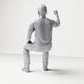 Foto de producto de maqueta para diorama 2: Figura sentada: espectador con el puño cerrado en alto (B066)