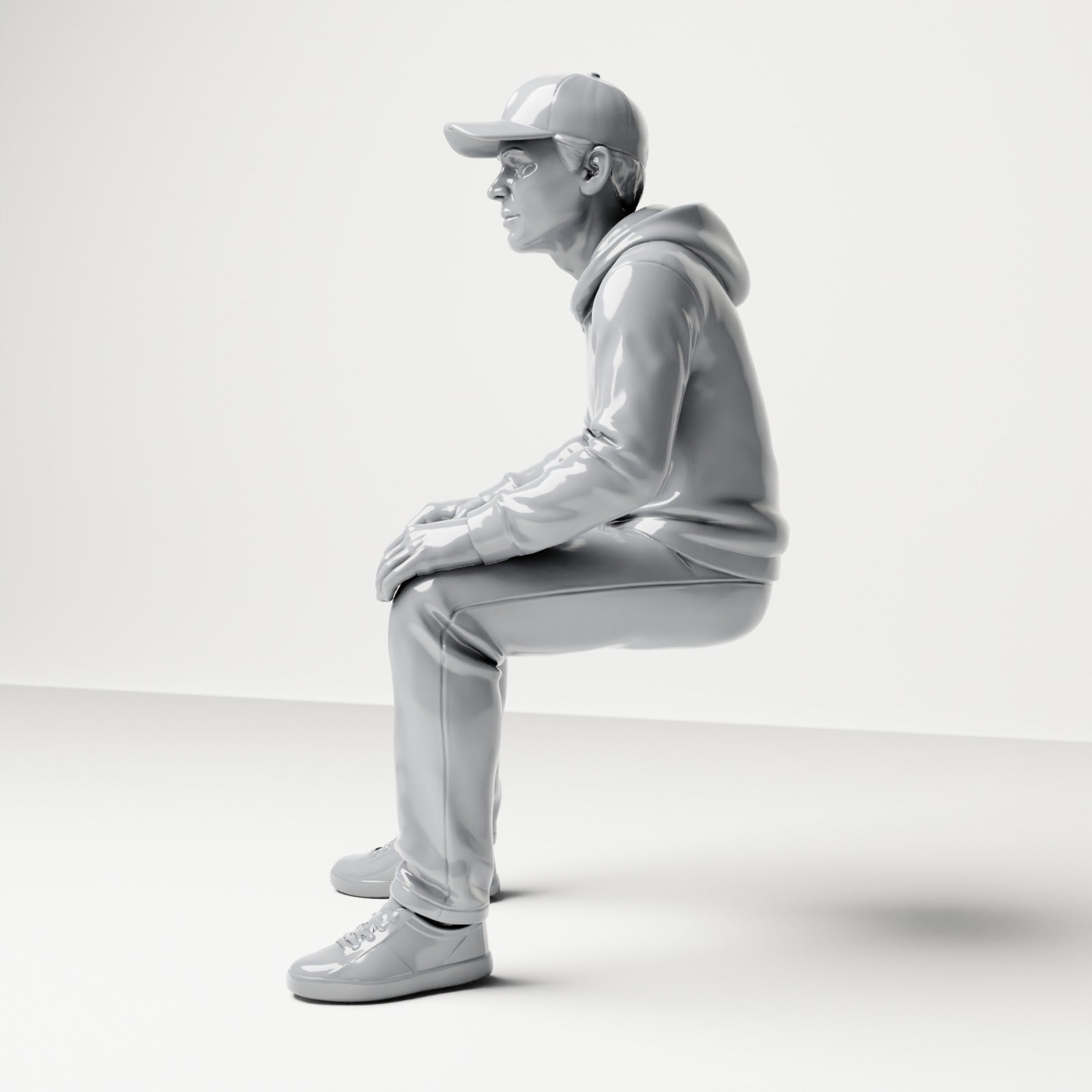 Foto de producto de maqueta para diorama 1: Figura sentada: hombre con gorra y sudadera con capucha (B070)