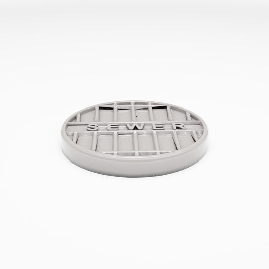 Foto de producto de diorama y modelismo 0: Diorama de calle: Tapa de alcantarilla de hierro fundido «SEWER» (Ref. 1042D)