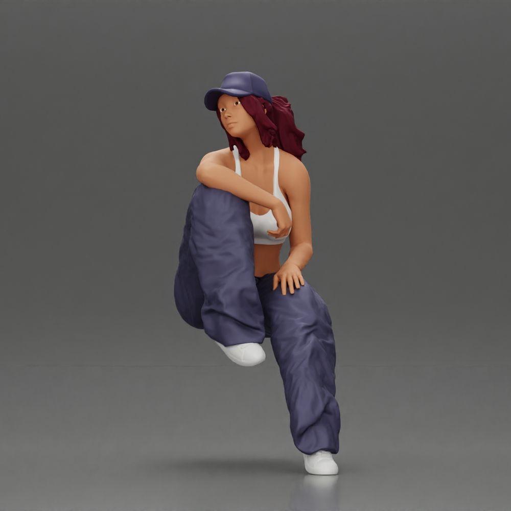Diorama modelismo foto de producto 0: figura en miniatura: mujer lowrider sentada con gorra, brazo sobre la rodilla, camiseta sin mangas y zapatillas (Ref Nr. A138)