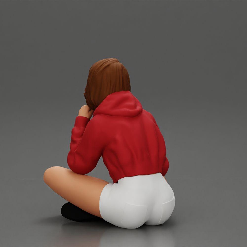 Foto del producto de modelismo de diorama 15: Miniatura de diorama: Mujer sentada con chaqueta y pantalones cortos con paraguas abierto (Ref Nr. A85)