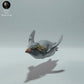 Foto de producto de figura animal Animal Den Miniatures 1: Figura animal marina: pingüino saltarrocas nadando (22_12_10)