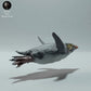 Foto de producto figura animal Animal Den Miniatures 3: figura de animal marino: pingüino saltarrocas - nadando (22_12_10)