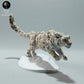 Foto de producto de figura animal Animal Den Miniatures 1: Figura de animal salvaje: leopardo de las nieves - caminando (22_12_11)
