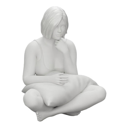 Foto del producto de modelismo de diorama 0: Niña sentada frente al televisor con almohadas en las piernas (Ref Nr. A36)