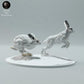 Foto de producto de figura animal Animal Den Miniatures 2: Figura animal polar: liebres de nieve corriendo (23_01_16)