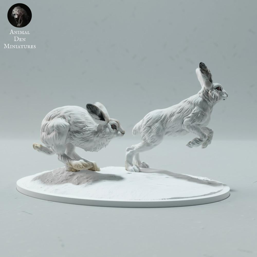 Foto de producto de figura animal Animal Den Miniatures 2: Figura animal polar: liebres de nieve corriendo (23_01_16)