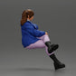 Foto de producto para diorama y modelismo 2: Figura sentada: mujer con las piernas cruzadas, coleta y chaqueta (a161)