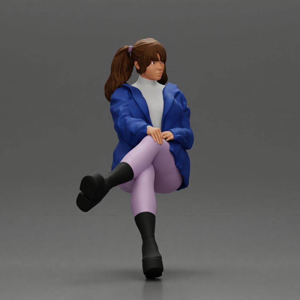 Foto de producto de modelismo para diorama 6: Figura sentada: mujer con las piernas cruzadas, coleta y chaqueta (a161)