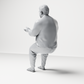 Diorama Modellbau Produktfoto 9: Sitzende Figur: Gestikulierender Mann mit Pullover, Hose & Flip-Flops (a165)
